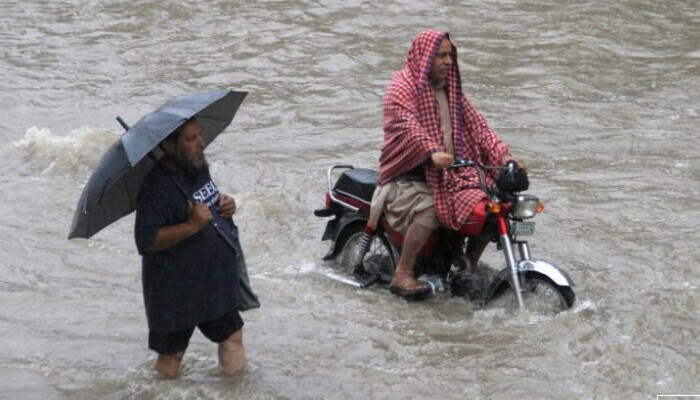 Puddles and ponds pockmark Punjab roads