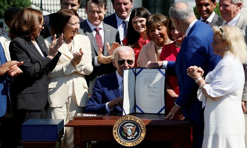 Biden signs bill to boost US chips, compete with China