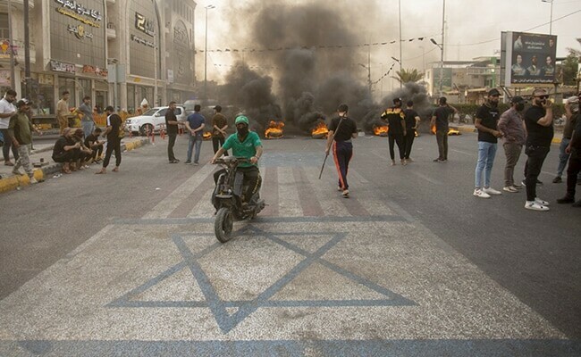 Clashes in Baghdad&rsquo;s Green Zone leave 23 protesters dead