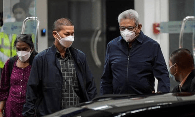 Ousted Sri Lankan leader faces arrest calls after return