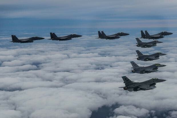 N.Korea fires missiles, flies warplanes as it blames US for &lsquo;escalation&rsquo;