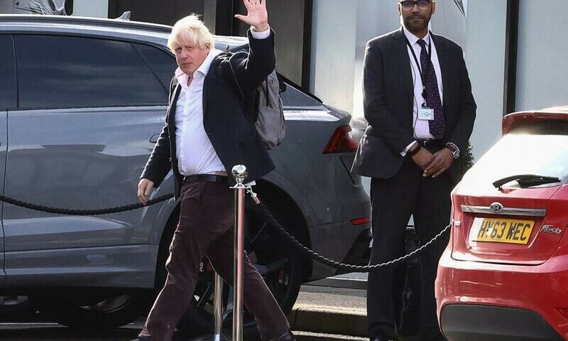 Boris Johnson arrives back in Britain to attempt rapid political comeback