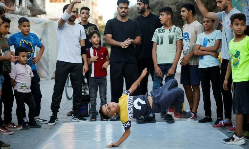 Gaza children breakdance to kick stress away