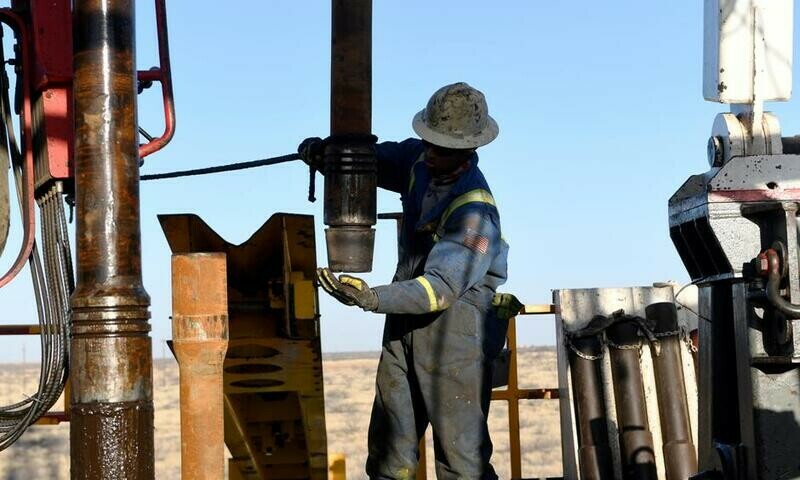 Oil prices edge higher as dollar eases