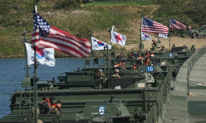 NKorea warns of heavy price if US, SKorea attack