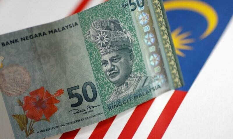 Malaysian currency, stocks down after inconclusive election