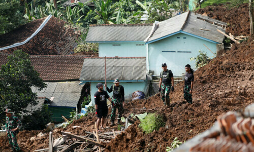 Hunt for buried survivors after Indonesia quake kills 162