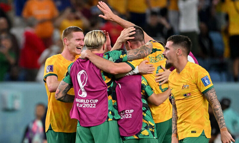 Australia reach World Cup last 16 and send Denmark home