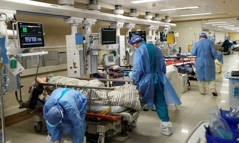 Chinese hospitals &lsquo;extremely busy&rsquo; as Covid spreads unchecked