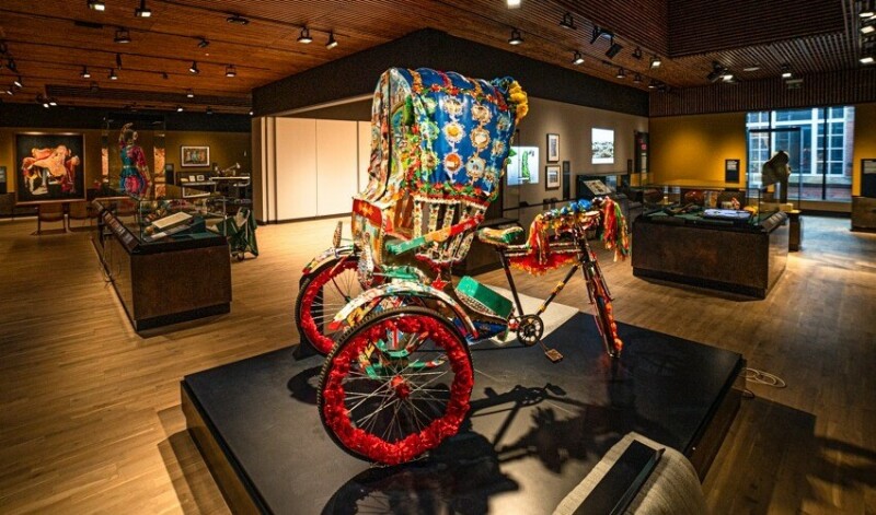 A rickshaw has been decorated with Mancunian imagery as well as Bangladeshi designs 