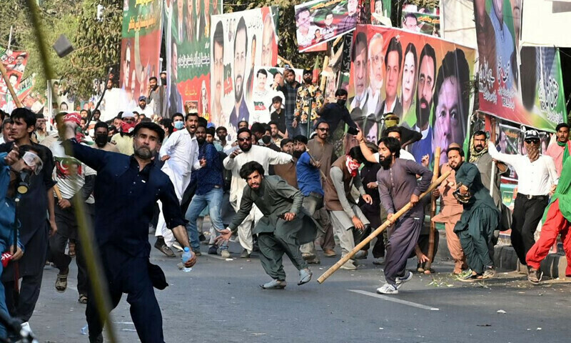 PTI supporters, police standoff in pictures