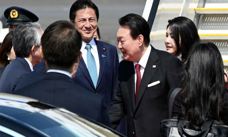 South Korea president arrives in Japan to open &lsquo;new chapter&rsquo;