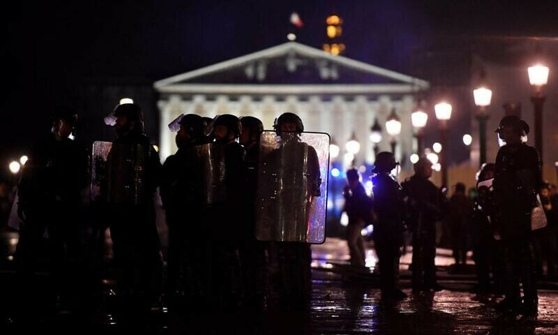 French protest over Macron forcing through pension reform