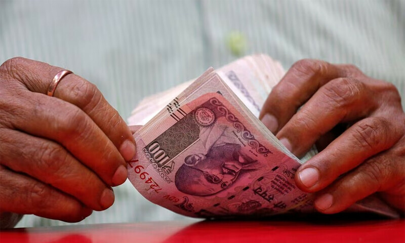India Rupee tad weaker as US data stokes Fed hike bets