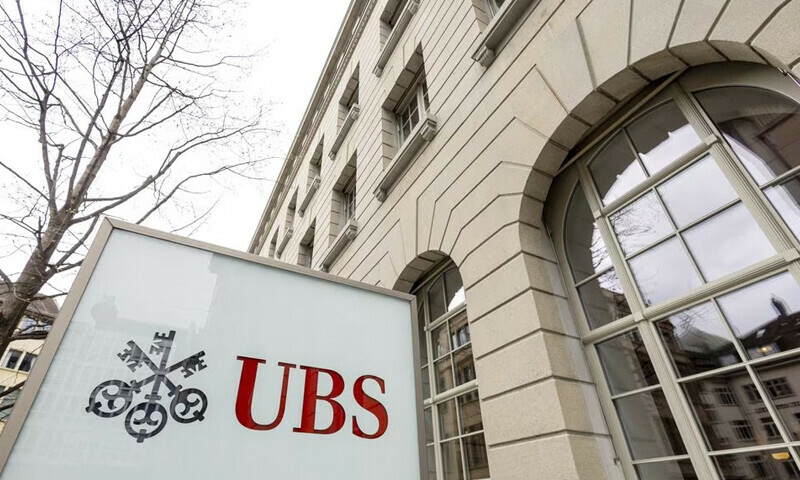 UBS quarterly profit tumbles as cost of old toxic debt mounts
