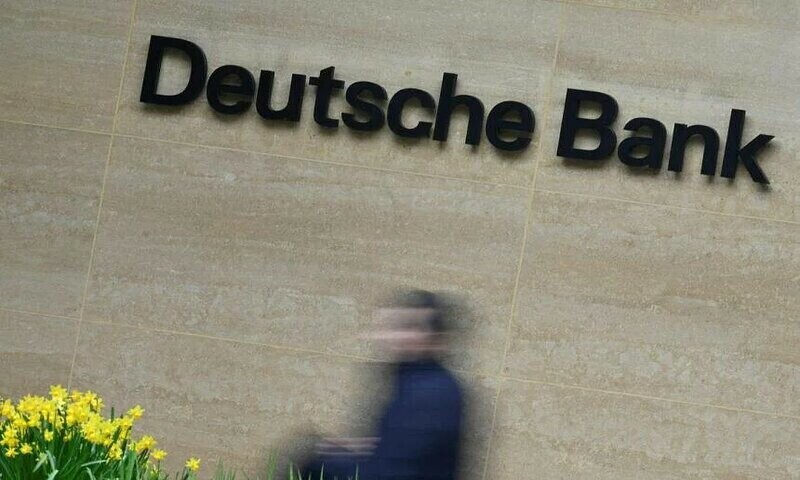 Deutsche Bank to make more cuts as profits rise