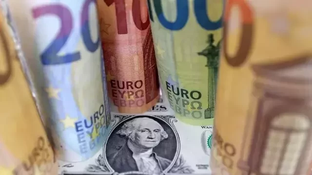 Dollar slides after Fed signals pause; banking woes dent confidence