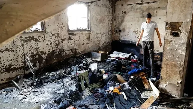 Two dead in West Bank, Israel strikes Gaza, Palestinians fire rockets