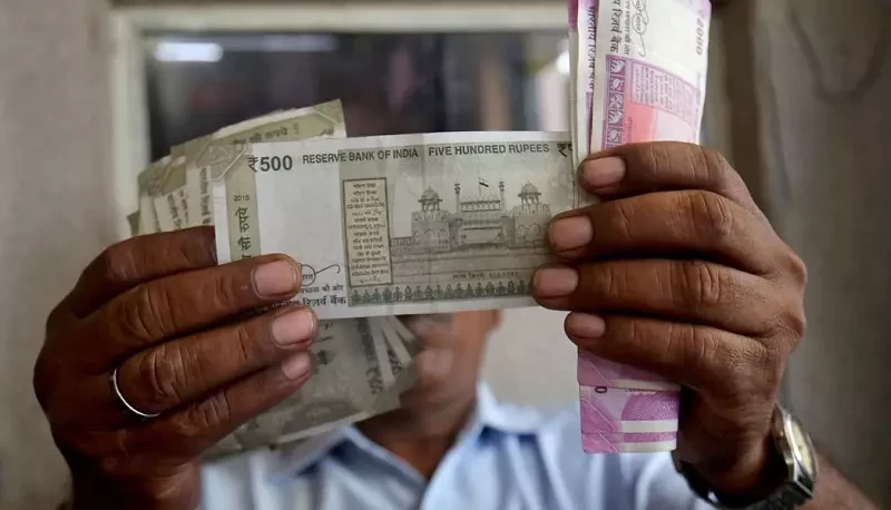 Indian rupee caught between rising Fed rate hike odds and support at 82.80/dollar