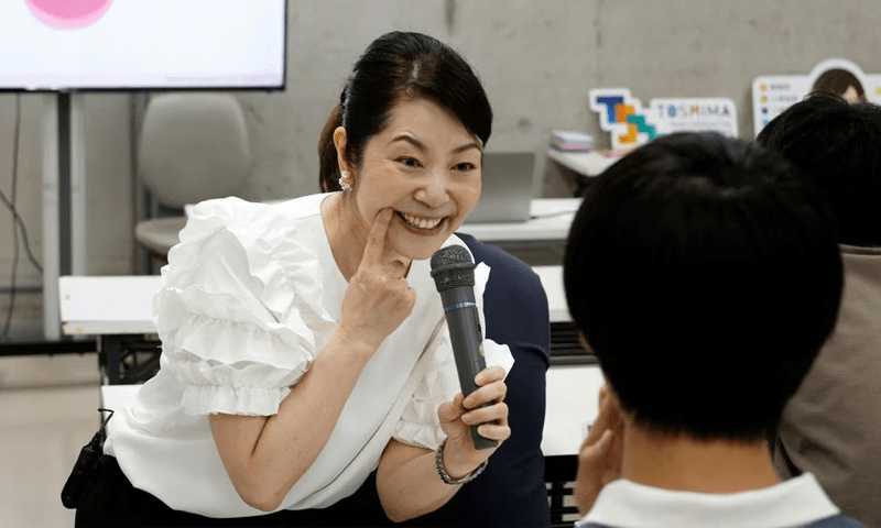 In Japan, people take classes to learn how to smile again