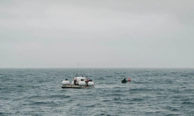 Rescuers in all-night race to save Titanic sub crew