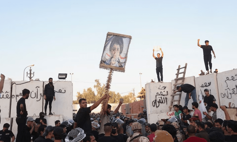 Iraqis storm, set fire to Swedish embassy over Quran desecration