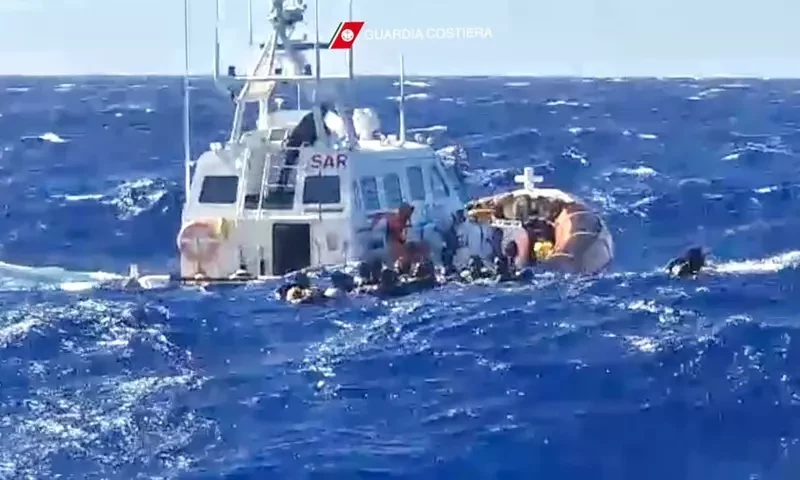 Stranded migrants saved, but dozens missing off Italy in rough seas