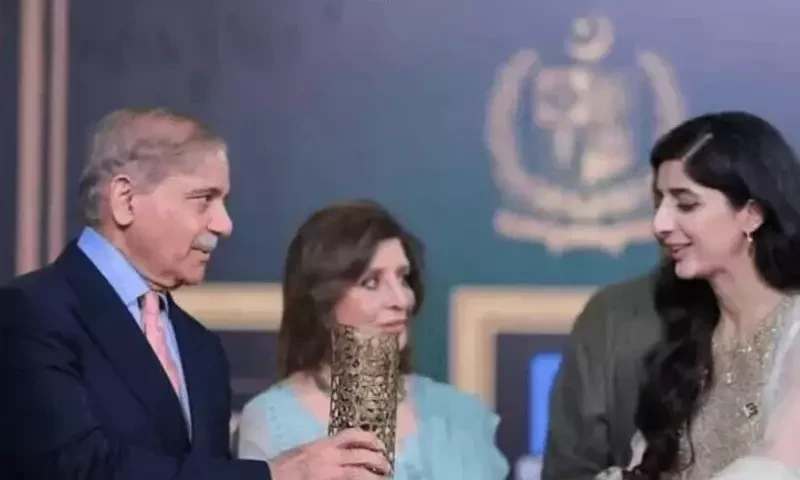 Outgoing PM Shehbaz presents awards, health cards to celebrities