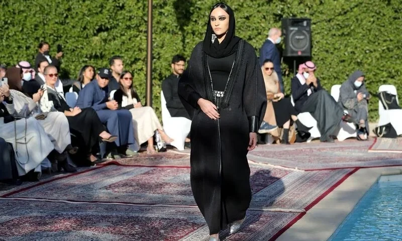 French ban of abaya robes in schools draws applause, criticism