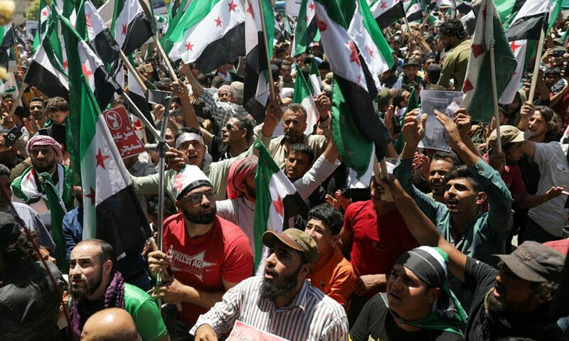 Syrians rally in south against Assad, economic decline