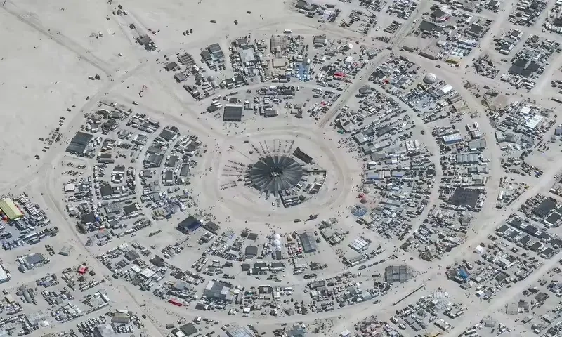 US Burning Man festival turns into mud bath after rainstorm