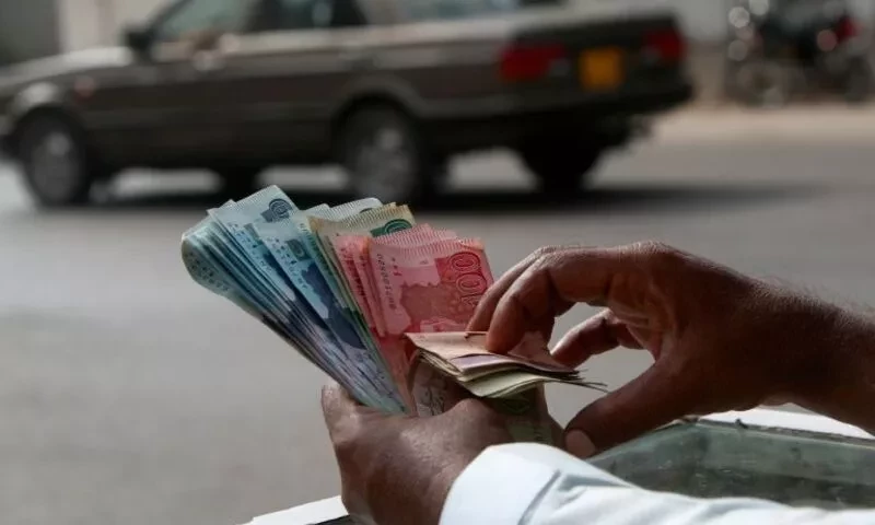 Rupee records marginal gains against dollar in interbank market