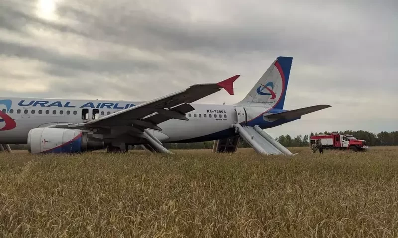 Russian airline with 159 passengers aboard makes emergency landing in field