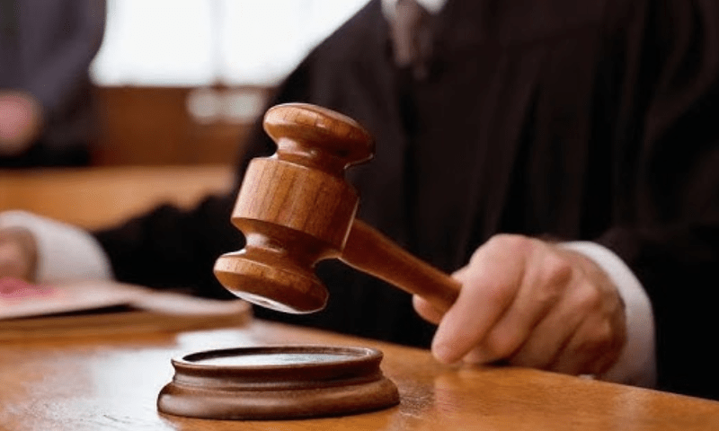 Man dares judge to punish him after throwing a shoe at him