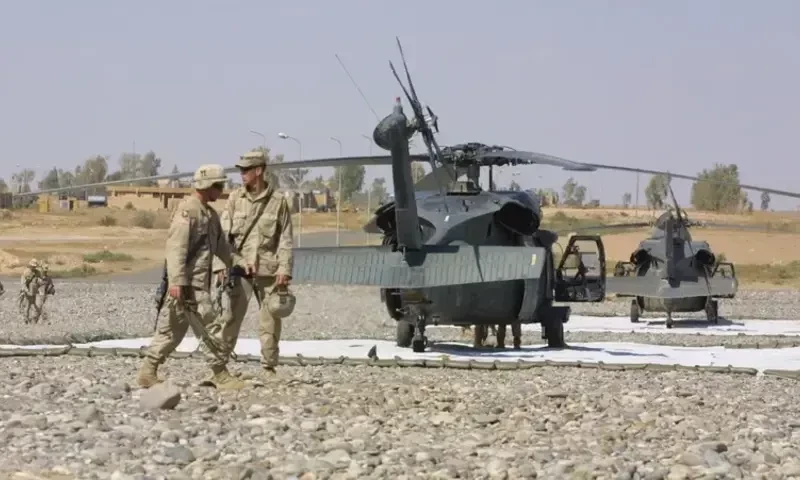 At least a dozen missiles target US forces at Iraq&rsquo;s Ain al-Asad air base