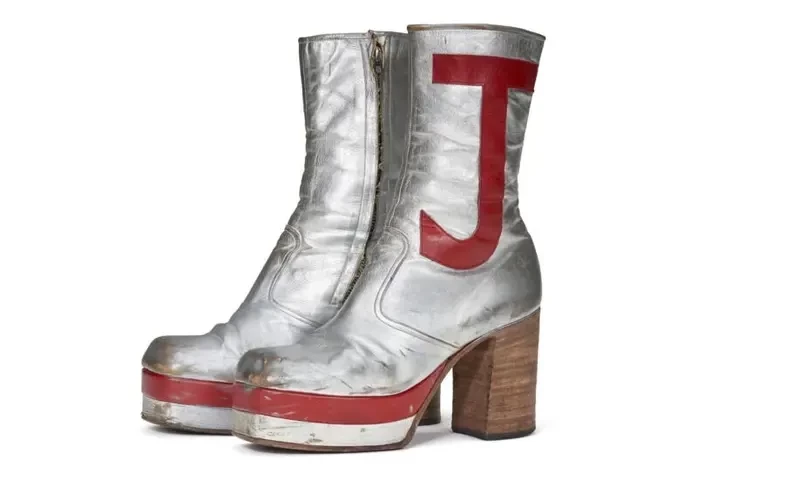 Elton John items fetch $8 million at New York auction