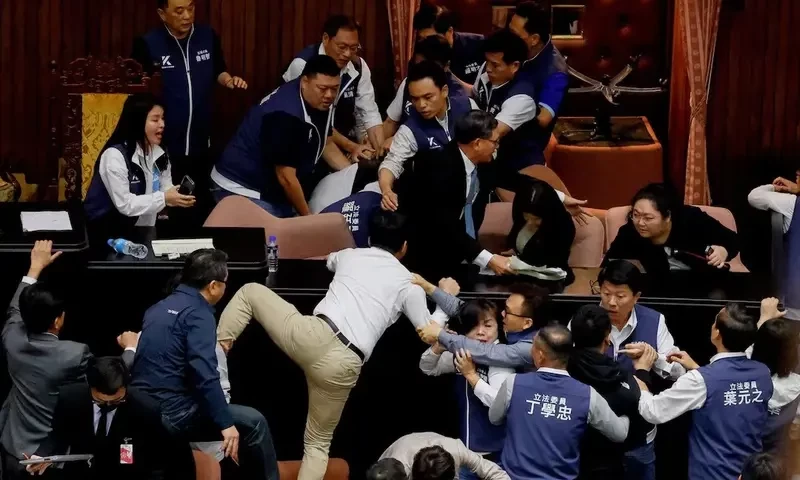 Taiwan lawmakers exchange blows in bitter dispute over parliament reforms