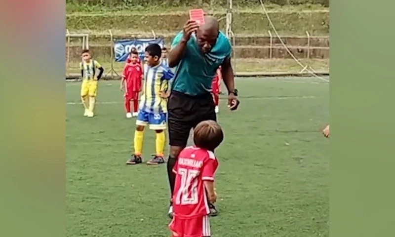 WATCH: &lsquo;Youngest player&rsquo; receives comical red card, hug from referee