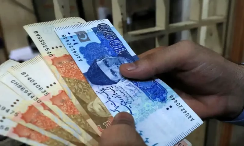 PKR strengthens slightly against dollar