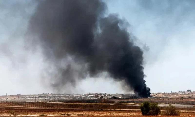 Israel tells Gaza residents to flee as it mounts an offensive