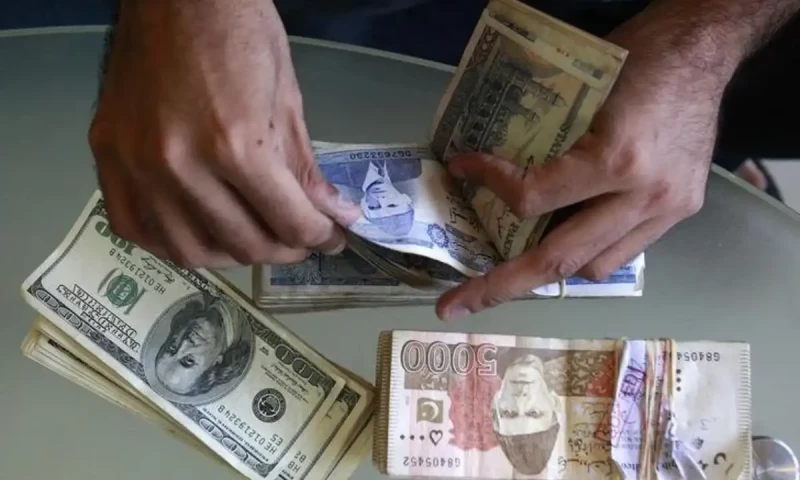 Rupee ticks up against dollar in interbank market
