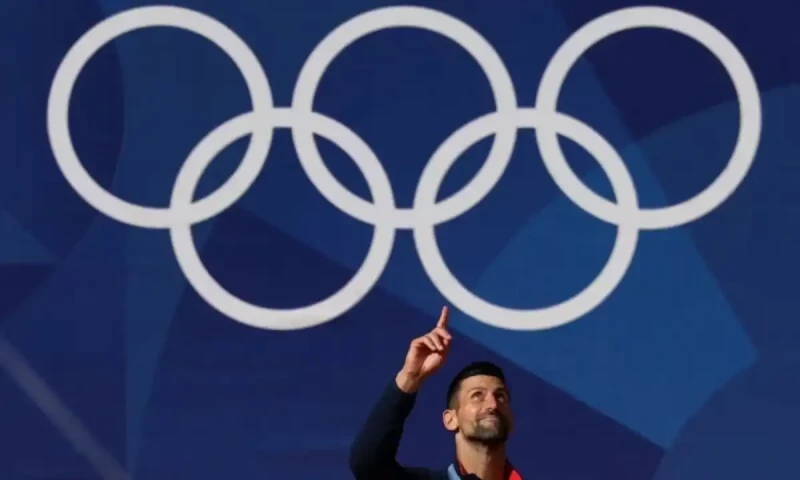 Djokovic fights off Alcaraz to finally strike gold