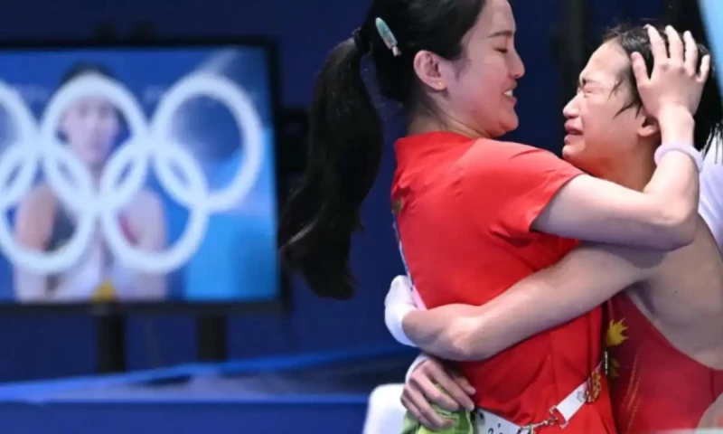 Perfectionist Quan wins third Olympic diving gold at age 17