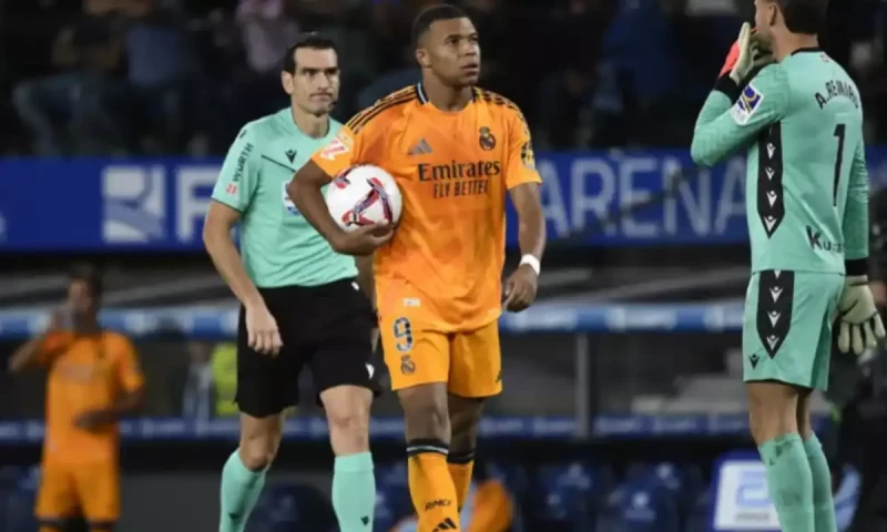 Vinicius, Mbappe penalties help Madrid beat Real Sociedad