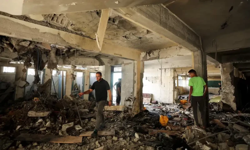 Palestinians say Israeli strike killed 22 in shelter, army says militants hit