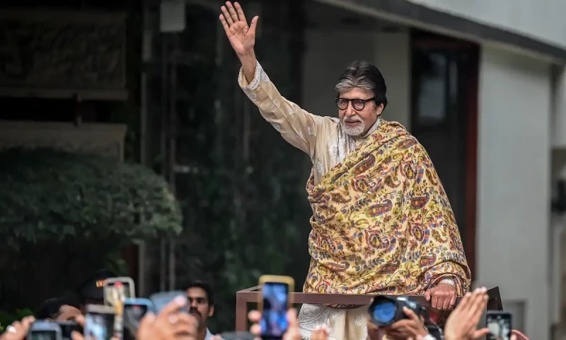 In Pictures: Amitabh Bachchan gestures to fans outside his residence on his 82nd birthday