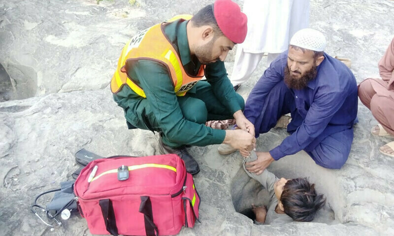 Rescue operation underway for boy trapped in rocky hole in Kahuta