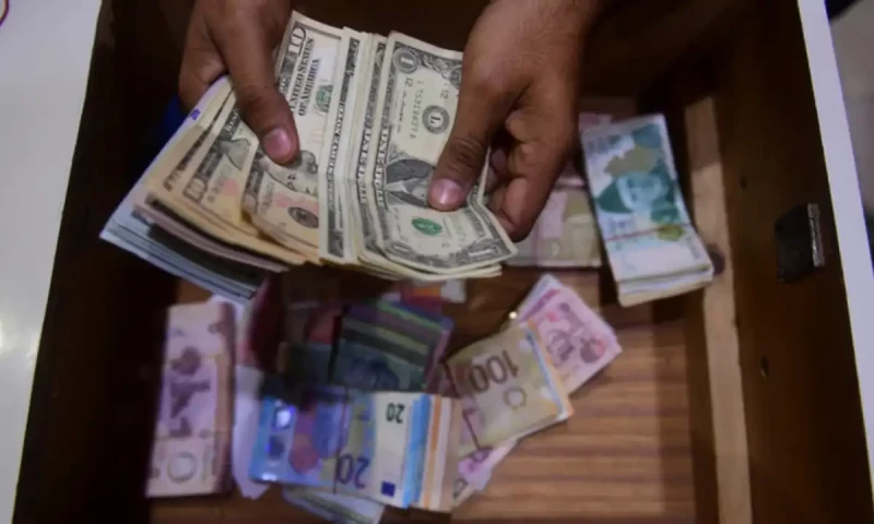 Rupee marginally declines against dollar in interbank