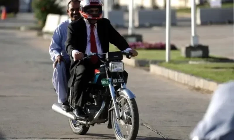 From now on, if you are riding pillion in Lahore, your partner also has to wear helmet