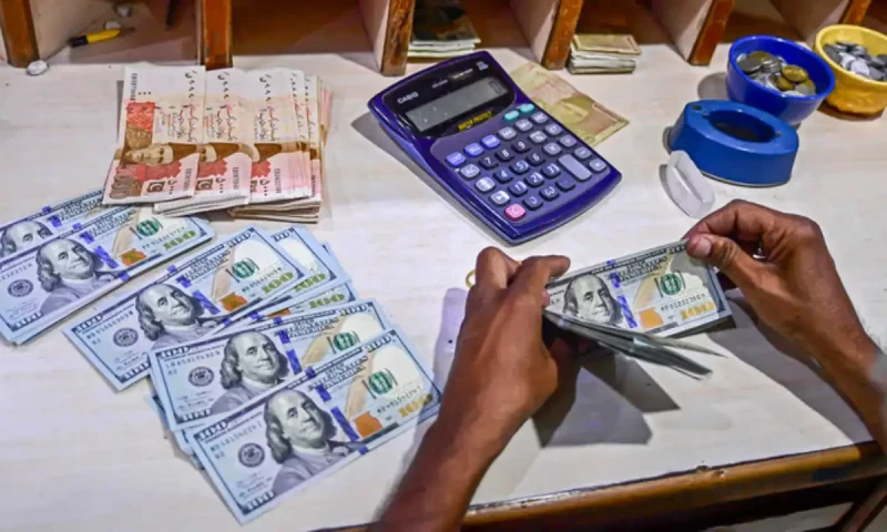 Rupee holds steady against dollar in intraday trading